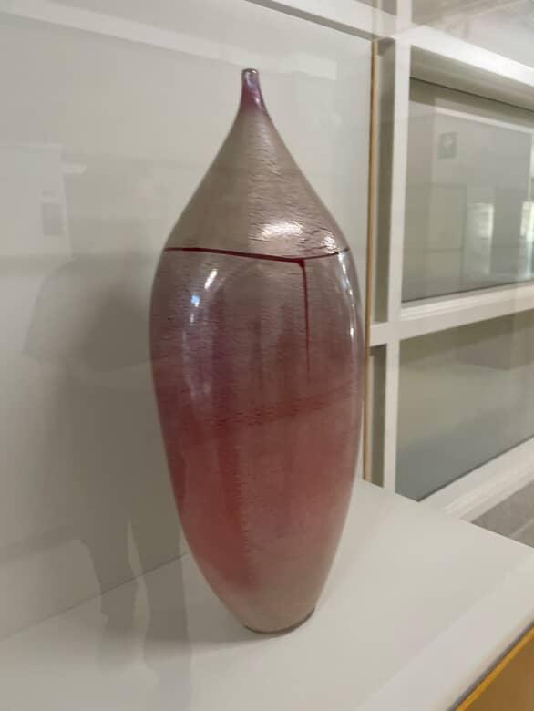 Material: Glass or glazed ceramic.
Properties: Glass/ceramic is smooth, translucent, and durable; the glaze creates a reflective, artistic surface.
Associated Program: Studio art glass program.
Documentation Notes: Focused on the smooth curves, gradient texture, and subtle red streaks.
<a href='https://www.youtube.com/embed/tgbNymZ7vqY' target='_blank'><p>Project Video Link</p></a>